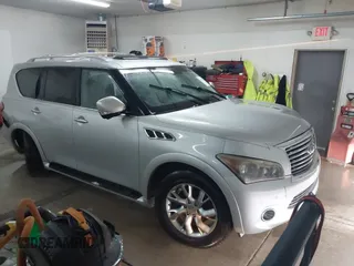 2011 Infiniti QX56 7-passenger with VIN JN8AZ2NF9B9500583, listed as a IAAI auction lot 41298295 with 162,611 mi miles and . Bid and sale history available at DreamBid. Image 1.