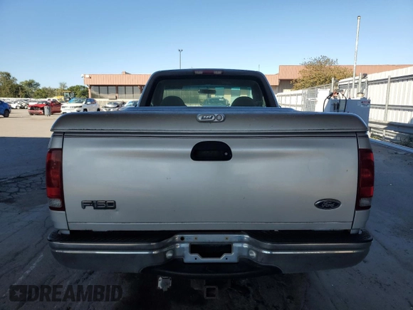 1999 Ford F-150 XL with VIN 1FTRF17L7XNA73732, listed as a Copart auction lot 74388514 with Not provided miles and Clean title. Bid and sale history available at DreamBid. Image 6.