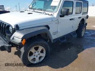 2020 Jeep Wrangler Unlimited Sport with VIN 1C4HJXDM2LW262867, listed as a IAAI auction lot 42303520 with 56,461 mi miles and . Bid and sale history available at DreamBid. Image 6.