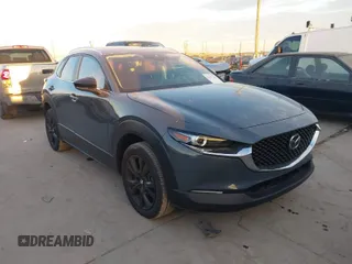 2023 Mazda CX-30 S Preferred z VIN 3MVDMBCM8PM571502, wystawiony jako IAAI lot #41353642 z przebiegiem 13 267 mil mil oraz . Historia ofert i sprzedaży dostępna na DreamBid. Obrazek 1.