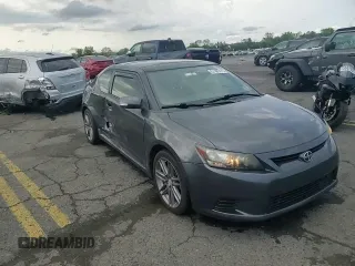 2013 Scion tC z VIN JTKJF5C71D3052789, wystawiony jako Copart lot #57482475 z przebiegiem 148 706 mil mil oraz Szkoda całkowita • Salvage title. Historia ofert i sprzedaży dostępna na DreamBid. Obrazek 13.