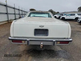1984 Chevrolet El Camino z VIN 1GCCW80HXER207627, wystawiony jako Copart lot #77284194 z przebiegiem 90 554 mil mil oraz Szkoda całkowita • Salvage title. Historia ofert i sprzedaży dostępna na DreamBid. Obrazek 6.