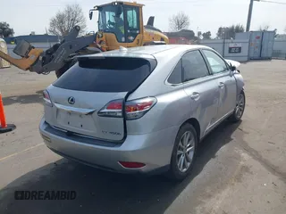 2015 Lexus RX 450h with VIN 2T2ZB1BA7FC002089, listed as a IAAI auction lot 41826675 with 100,852 mi miles and . Bid and sale history available at DreamBid. Image 4.