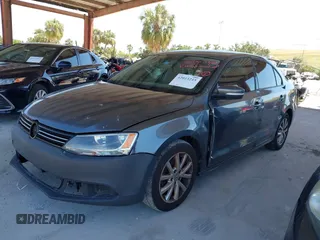 2012 Volkswagen Jetta Sedan SE w/Convenience with VIN 3VWDX7AJ6CM407834, listed as a IAAI auction lot 42013215 with 168,035 mi miles. Bid and sale history available at carsss.com. Image 2.