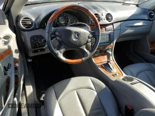 2007 Mercedes-Benz CLK 550 with VIN WDBTK72F27T076330, listed as a Copart auction lot 80770694 with 126,018 mi miles and Salvage Title. Bid and sale history available at DreamBid. Image 8.