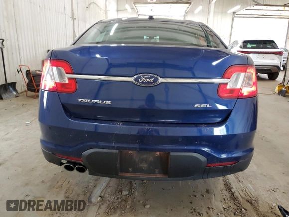 2012 Ford Taurus SEL z VIN 1FAHP2EW6CG143656, wystawiony jako Copart lot #60058705 z przebiegiem 169 900 mil mil oraz Szkoda całkowita • Salvage title. Historia ofert i sprzedaży dostępna na DreamBid. Obrazek 6.
