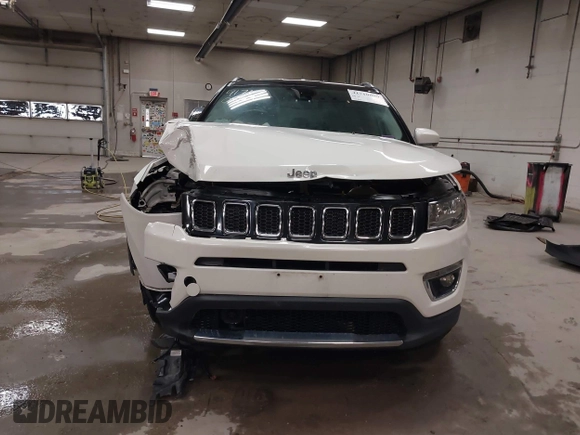 2021 Jeep Compass Limited with VIN 3C4NJCCB0MT576990, listed as a IAAI auction lot 41710809 with 77,903 mi miles. Bid and sale history available at carsss.com. Image 12.