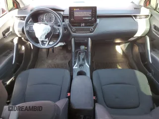 2022 Toyota Corolla Cross LE with VIN 7MUCAABG8NV008867, listed as a Copart auction lot 57232415 with 48,670 mi miles and Salvage title. Bid and sale history available at DreamBid. Image 8.
