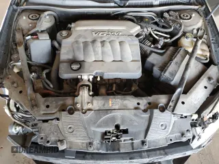 2015 Chevrolet Impala LS with VIN 2G1WA5E37F1158008, listed as a Copart auction lot 61977635 with 106,437 mi miles and Salvage title. Bid and sale history available at DreamBid. Image 11.