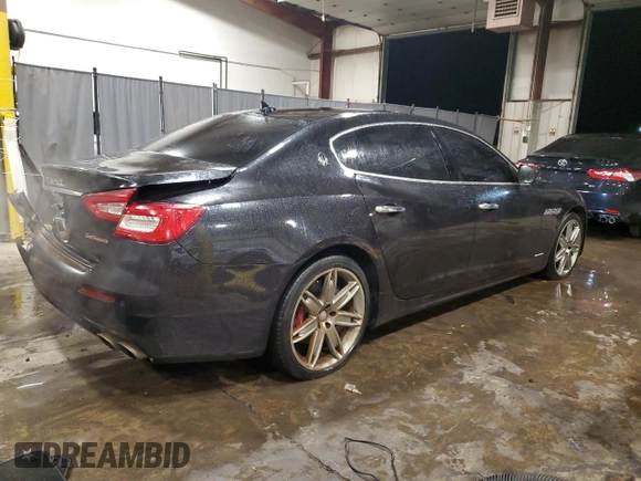 2017 Maserati Quattroporte z VIN ZAM56RRL4H1217395, wystawiony jako Copart lot #83762004 z przebiegiem 41 409 mil mil oraz Szkoda całkowita • Salvage title. Historia ofert i sprzedaży dostępna na DreamBid. Obrazek 3.