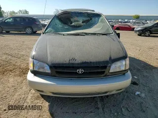 2000 Toyota Sienna LE with VIN 4T3ZF13C5YU287280, listed as a Copart auction lot 71397554 with 162,851 mi miles and Clean Title. Bid and sale history available at carsss.com. Image 12.