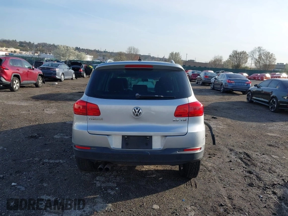 2013 Volkswagen Tiguan S with VIN WVGAV3AX0DW572915, listed as a IAAI auction lot 41937763 with 65,136 mi miles and . Bid and sale history available at DreamBid. Image 16.