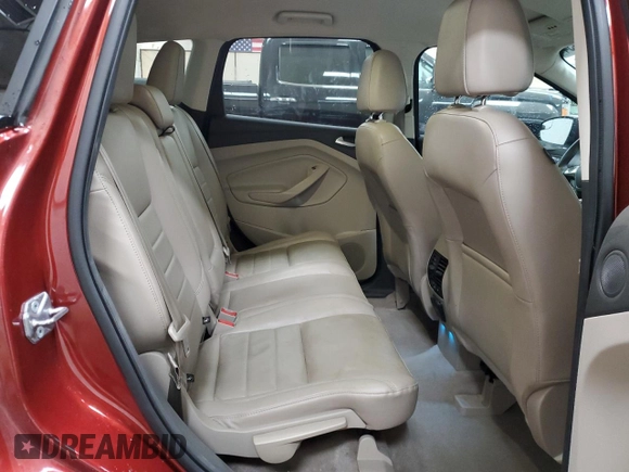 2016 Ford Escape Titanium with VIN 1FMCU9J95GUC57205, listed as a Copart auction lot 71033934 with 90,477 mi miles and Salvage Title. Bid and sale history available at DreamBid. Image 11.