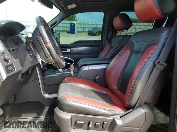 2014 Ford F-150 SVT Raptor with VIN 1FTFW1R60EFA69717, listed as a Copart auction lot 67408424 with 184,866 mi miles and Salvage Title. Bid and sale history available at carsss.com. Image 7.