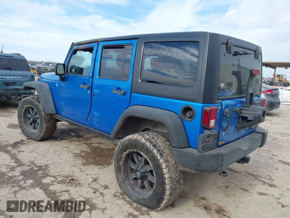 2015 Jeep Wrangler Unlimited Rubicon with VIN 1C4BJWFG5FL558348, listed as a IAAI auction lot 41460025 with 106,012 mi miles. Bid and sale history available at carsss.com. Image 3.