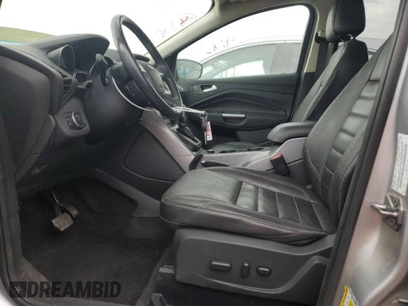 2016 Ford Escape SE z VIN 1FMCU0G91GUC59990, wystawiony jako Copart lot #56956395 z przebiegiem 112 706 mil mil oraz Szkoda całkowita • Salvage title. Historia ofert i sprzedaży dostępna na DreamBid. Obrazek 7.