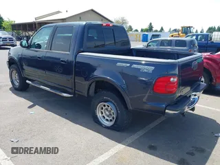 2001 Ford F-150 XLT with VIN 1FTRW08L31KC32022, listed as a IAAI auction lot 42317242 with Not provided miles and . Bid and sale history available at DreamBid. Image 3.
