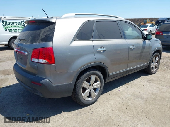 2012 Kia Sorento EX with VIN 5XYKU3A60CG305675, listed as a IAAI auction lot 42647223 with 174,447 mi miles and . Bid and sale history available at DreamBid. Image 4.
