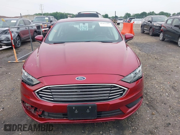 2017 Ford Fusion SE with VIN 3FA6P0H75HR221571, listed as a IAAI auction lot 42452297 with 91,354 mi miles and . Bid and sale history available at DreamBid. Image 12.