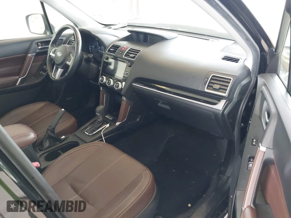 2018 Subaru Forester Touring with VIN JF2SJAWC2JH598982, listed as a IAAI auction lot 42455652 with 57,254 mi miles and . Bid and sale history available at DreamBid. Image 5.