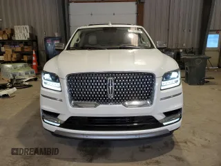 2019 Lincoln Navigator Black Label z VIN 5LMJJ3TT4KEL19103, wystawiony jako Copart lot #61081284 z przebiegiem 58 418 mil mil oraz Szkoda całkowita • Salvage title. Historia ofert i sprzedaży dostępna na DreamBid. Obrazek 5.