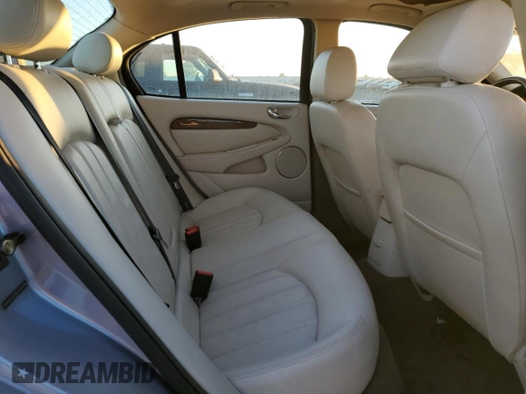 2007 Jaguar X-Type z VIN SAJWA51A27WJ21259, wystawiony jako Copart lot #42643115 z przebiegiem 106 800 mil mil oraz Szkody całkowita. Historia ofert i sprzedaży dostępna na DreamBid. Obrazek 10.