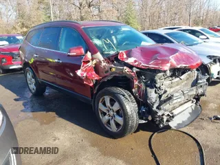 2016 Chevrolet Traverse LT z VIN 1GNKRGKD1GJ244792, wystawiony jako IAAI lot #40927502 z przebiegiem 140 602 mil mil oraz . Historia ofert i sprzedaży dostępna na DreamBid. Obrazek 1.