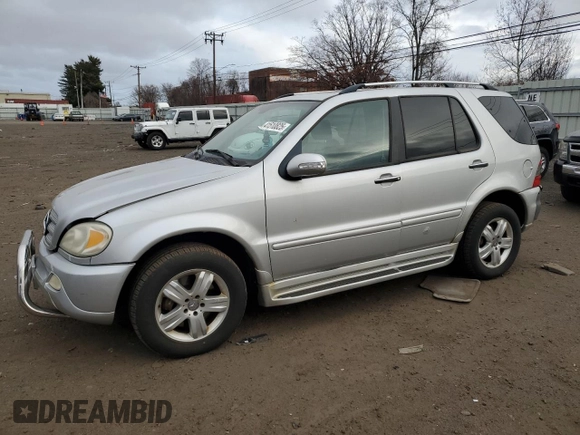 2005 Mercedes-Benz M 500 with VIN 4JGAB75E65A532359, listed as a Copart auction lot 41510825 with 139,916 mi miles and Salvage title. Bid and sale history available at DreamBid. Image 1.