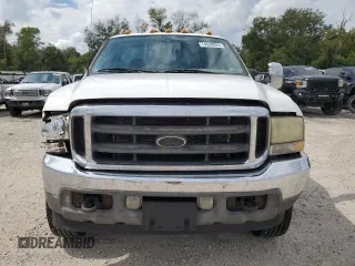 2002 Ford F-350 XL with VIN 1FTSF31L42EA65313, listed as a Copart auction lot 74520824 with 155,237 mi miles and Salvage Title. Bid and sale history available at DreamBid. Image 5.