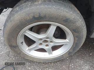 1997 Mercury Mountaineer z VIN 4M2DU55P5VUJ44923, wystawiony jako IAAI lot #42263688 z przebiegiem 146 159 mil mil oraz . Historia ofert i sprzedaży dostępna na DreamBid. Obrazek 12.