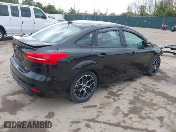 2015 Ford Focus SE with VIN 1FADP3F27FL386775, listed as a IAAI auction lot 42133393 with 102,960 mi miles and . Bid and sale history available at DreamBid. Image 4.