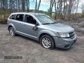 2015 Dodge Journey SXT with VIN 3C4PDCBG5FT696882, listed as a IAAI auction lot 41848362 with 175,039 mi miles and . Bid and sale history available at DreamBid. Image 1.