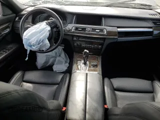 2015 BMW 7 Series 750i xDrive with VIN WBAYB6C59FD965994, listed as a Copart auction lot 53994545 with 119,929 mi miles and Salvage Title. Bid and sale history available at carsss.com. Image 8.