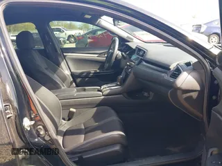 2019 Honda Civic Sport with VIN 19XFC2F86KE045495, listed as a IAAI auction lot 42074631 with 52,864 mi miles and . Bid and sale history available at DreamBid. Image 5.