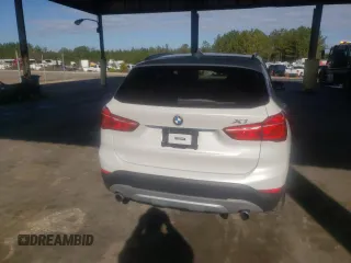 2017 BMW X1 sDrive28i with VIN WBXHU7C31H5H37217, listed as a Copart auction lot 70114342 with 73,683 mi miles. Bid and sale history available at carsss.com. Image 6.