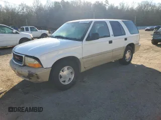 1998 GMC Jimmy SL with VIN 1GKCS13WXW2516025, listed as a Copart auction lot 88762955 with 140,381 mi miles and Salvage Title. Bid and sale history available at carsss.com. Image 1.