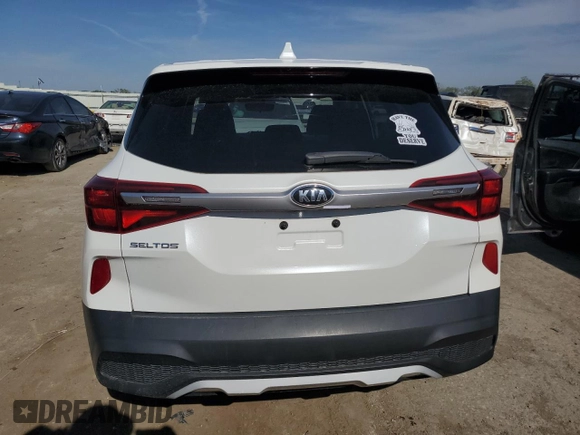 2021 Kia Seltos LX z VIN KNDEPCAA8M7163843, wystawiony jako Copart lot #53368575 z przebiegiem 72 081 mil mil oraz Szkoda całkowita • Salvage title. Historia ofert i sprzedaży dostępna na DreamBid. Obrazek 6.