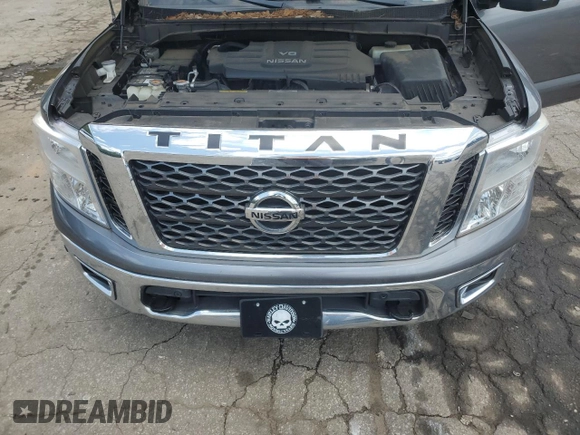 2017 Nissan Titan Platinum Reserve z VIN 1N6AA1E56HN571502, wystawiony jako Copart lot #56751155 z przebiegiem 105 017 mil mil oraz Szkoda całkowita • Salvage title. Historia ofert i sprzedaży dostępna na DreamBid. Obrazek 11.