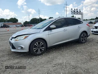 2013 Ford Focus SE with VIN 1FADP3F25DL106039, listed as a Copart auction lot 63492965 with 113,553 mi miles and Salvage title. Bid and sale history available at DreamBid. Image 1.