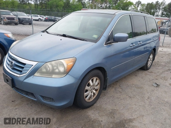 2009 Honda Odyssey EX-L with VIN 5FNRL38709B016019, listed as a IAAI auction lot 42087099 with 227,141 mi miles. Bid and sale history available at carsss.com. Image 2.