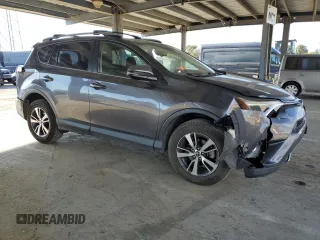 2018 Toyota RAV4 XLE with VIN JTMRFREV5JJ739620, listed as a Copart auction lot 48218185 with 82,885 mi miles and Salvage Title. Bid and sale history available at DreamBid. Image 4.