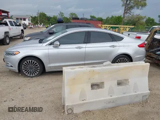 2017 Ford Fusion SE z VIN 3FA6P0HD5HR166433, wystawiony jako IAAI lot #42394998 z przebiegiem 121 333 mil mil oraz . Historia ofert i sprzedaży dostępna na DreamBid. Obrazek 14.