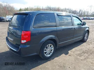 2013 Dodge Grand Caravan SXT with VIN 2C4RDGCG2DR652708, listed as a IAAI auction lot 42043026 with 245,442 mi miles and . Bid and sale history available at DreamBid. Image 4.