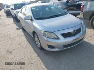 2009 Toyota Corolla with VIN 1NXBU40E59Z078727, listed as a IAAI auction lot 42035739 with 113,814 mi miles. Bid and sale history available at carsss.com. Image 1.
