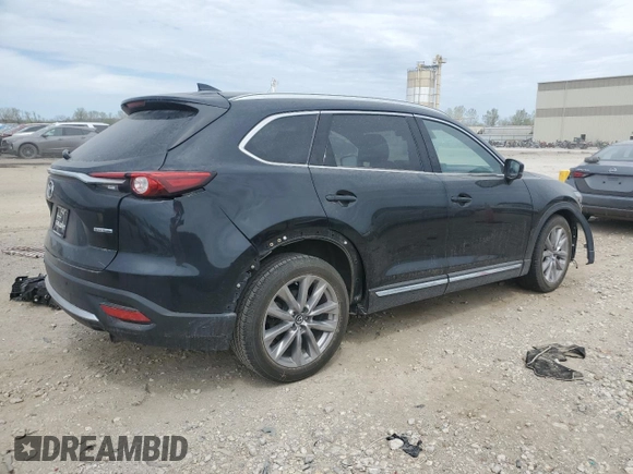 2021 Mazda CX-9 Carbon Edition z VIN JM3TCADY9M0514372, wystawiony jako Copart lot #52902555 z przebiegiem 99 812 mil mil oraz Szkoda całkowita • Salvage title. Historia ofert i sprzedaży dostępna na DreamBid. Obrazek 3.
