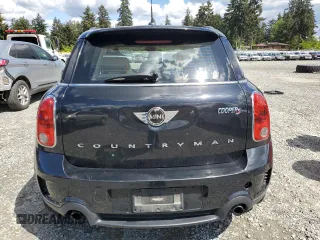 2013 MINI Countryman S ALL4 z VIN WMWZC5C56DWP33270, wystawiony jako Copart lot #56804085 z przebiegiem 141 637 mil mil oraz Szkoda całkowita • Salvage title. Historia ofert i sprzedaży dostępna na DreamBid. Obrazek 6.