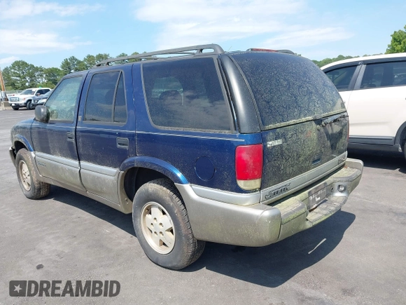 2001 GMC Jimmy SLE z VIN 1GKDT13W612136433, wystawiony jako IAAI lot #42336277 z przebiegiem Nie podano mil oraz . Historia ofert i sprzedaży dostępna na DreamBid. Obrazek 3.