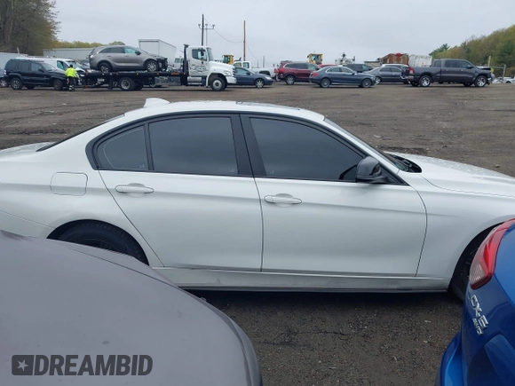 2014 BMW 3 Series 328i xDrive with VIN WBA3B5C56EP544400, listed as a IAAI auction lot 42172100 with 242,472 mi miles. Bid and sale history available at carsss.com. Image 13.