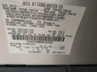 2013 Ford Taurus SE z VIN 1FAHP2D80DG162403, wystawiony jako IAAI lot #42381856 z przebiegiem 231 480 mil mil oraz . Historia ofert i sprzedaży dostępna na DreamBid. Obrazek 9.