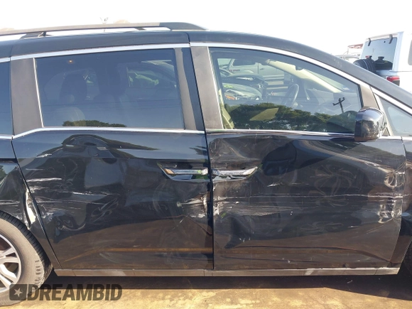 2013 Honda Odyssey EX-L with VIN 5FNRL5H6XDB090768, listed as a IAAI auction lot 42008759 with 116,052 mi miles and . Bid and sale history available at carsss.com. Image 13.